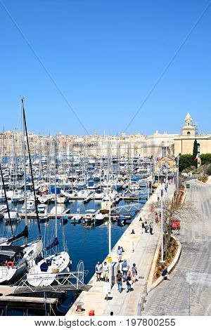 VITTORIOSA, MALTA - MARCH 31, 2017 - Elevated view of Vittoriosa marina and waterfront with views towards Valletta Vittoriosa (Birgu) Malta Europe, March 31, 2017.