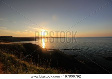Dramatic sunset landscape with clouds on the beach Sinemorets Bulgaria