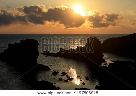 Dramatic sunrise on the beach with rocks Sinemorets Bulgaria