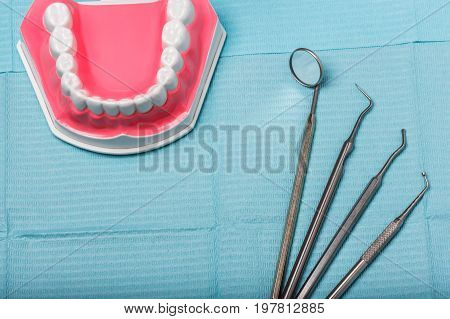 dental and endodontic instruments on the napkin. Top view