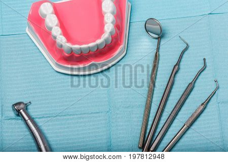 dental and endodontic instruments on the napkin. Top view