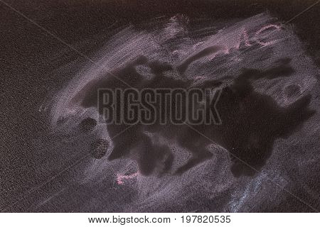 Blackboard chalkboard texture. Empty blank black chalkboard with chalk traces