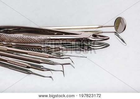 dental and endodontic instruments on the mirror. Top view