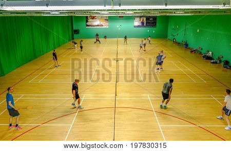 Redbridge Essex - June 6 2017: Social badminton at the sport's centre in Redbridge with players on court.