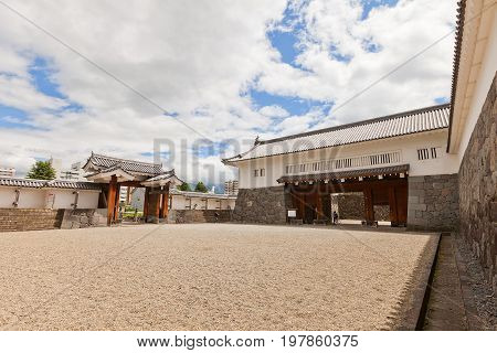YAMAGATA JAPAN - MAY 28 2017: Reconstructed (1991) complex of Eastern Main Gate (inner and outer gates and tower) of Yamagata Castle (founded in 1356). National historical site of Japan since 1986