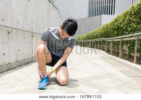 Sport man getting hurt on legs