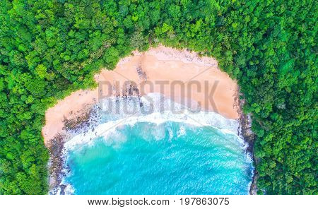 Sea aerial viewTop viewamazing nature background.The color of the water and beautifully bright.Azure beach with rocky mountains and clear water of Thailand ocean at sunny day.
