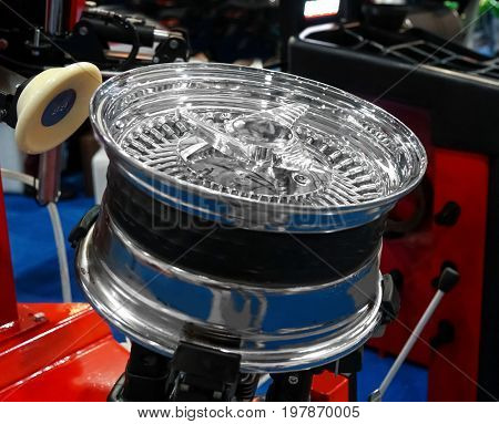 Wheel rim repair equipment presented in store, closeup