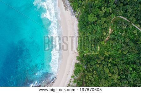 Sea aerial viewTop viewamazing nature background.The color of the water and beautifully bright.Azure beach with rocky mountains and clear water of Thailand ocean at sunny day.
