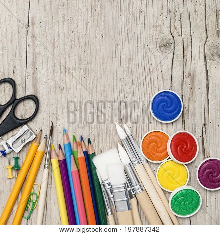 School Accessories On A Wooden Background