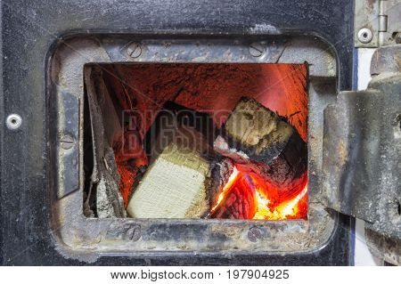 Wood Stove Firebox With Fire And Wood
