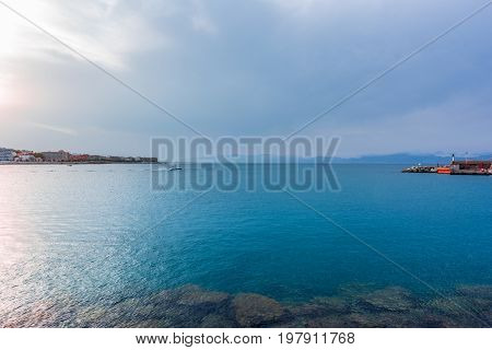 Sunset or blue hour in quiet port of l'Escala, Costa Brava, Spain. Mediterranean Sea