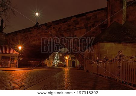 Charles bridge in the night. View from Kampa. Prague Czech Republic.