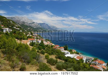 Pisak village in Croatia with Bikovo mountains and Makarska on the backgorund