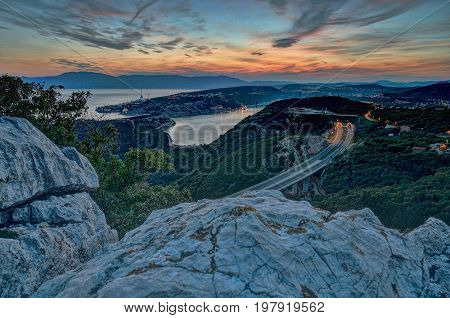 Sunset from Hreljin. Bakar and Rijeka on the background Croatia