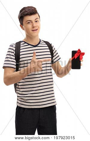Teenage student showing a phone with a red ribbon and pointing isolated on white background