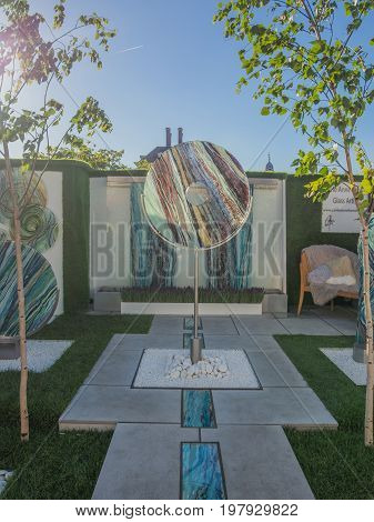 LONDON UK - MAY 25 2017: RHS Chelsea Flower Show 2017. Organic sculptural glass art for the garden display.