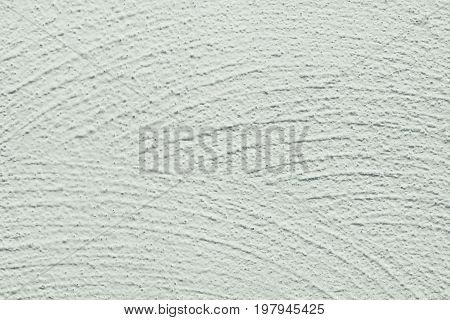 Whitewash lime textured grainy uneven background wide brushstrokes in semi circle shape blotchiness