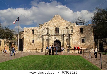 SAN ANTONIO, TX - FEBRUARY 27: Tourists and locals enjoy a visit to the historic Alamo compound, one of San Antonio's main attractions February 27, 2017 in San Antonio, TX.