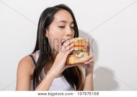Woman eating burger