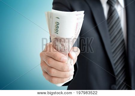 Businessman Hand Grabbing Money - Thai Baht (thb)