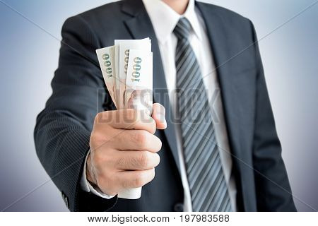 Businessman Hand Grabbing Money - Thai Baht (thb)