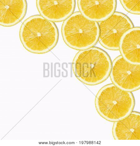 Seamless pattern of yellow lemon slices on white Background
