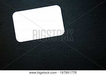 Blackboard (slate) with blank, white writable notepad