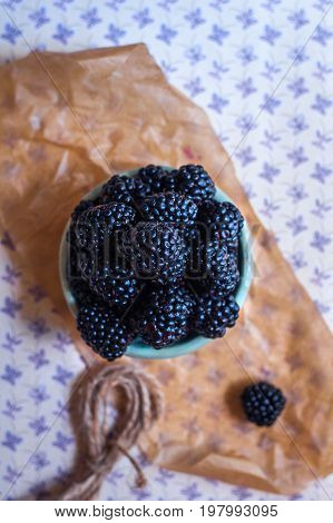 Homemade, sweet, delicious blackberries in a handmade dish