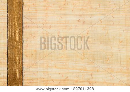 Real Egypt Papyrus Paper Background And Texture With Vertical Golden Line Number 17. Close Up Macro.