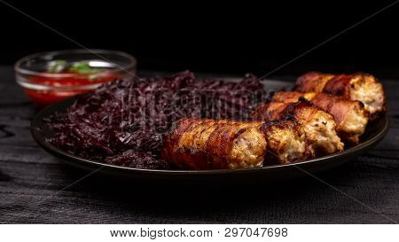 Fried Homemade Grilled Sausages Or Chevapchichi With Stewed Sauerkraut And Tomato Sauce On A Wooden 