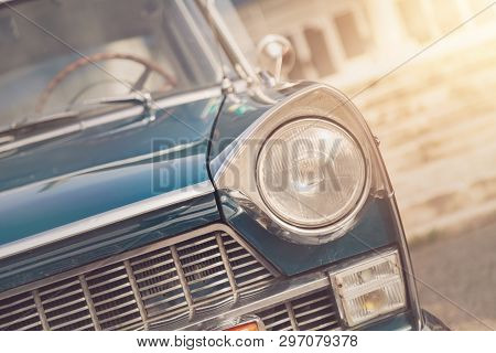 Detail Of A Vintage Car. Close Up Of Headlight Retro Classic Car. Vintage Effect Style Pictures. Cla