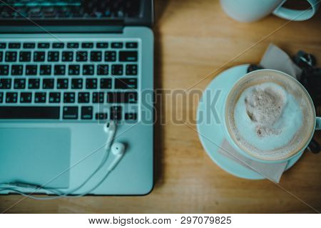 Laptop And Cappuccino Cup Top View In House Studio