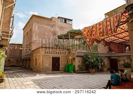 Aug 2017, Kashgar, Xinjinag, China: Small Square And Local Children In The Streets Of Kashgar Ancien