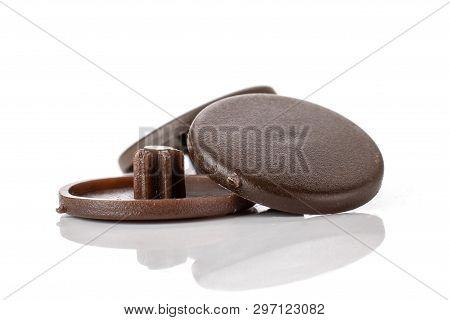 Group Of Three Whole Brown Plast Plugs Work Item Isolated On White Background