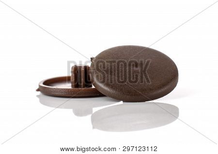 Group Of Two Whole Brown Plast Plugs Work Item Isolated On White Background