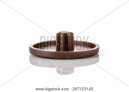 One Whole Dark Brown Plast Plug Work Item Isolated On White Background
