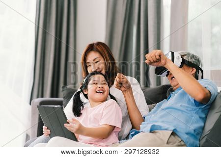 Lovely Happy People Playing Virtual Reality Game Together, Young Kid Girl Using Digital Tablet, Gran