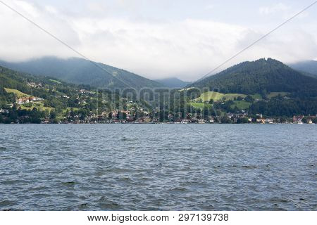 A View Of Lake Tegernsee In Germany On A Cloudy Summer Day