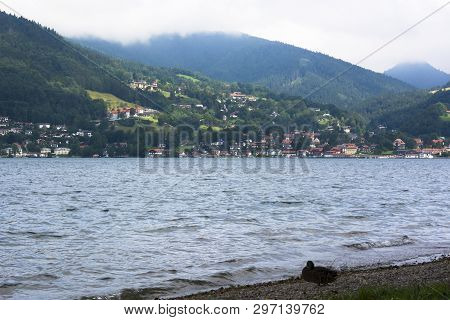 A View Of Lake Tegernsee In Germany On A Cloudy Summer Day