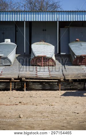 Weatherproof Boats On The Shafts In Anticipation Of The Arrival Of Water And The Opening Of The Fish