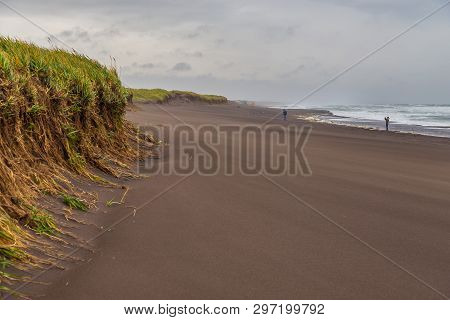 View Of The Waved Waves Of The Avachinskaya Bay , Avacha Bay And Volcanic Beaches. Kamchatka Peninsu