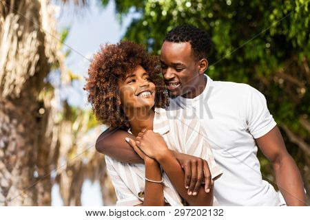 Outdoor Protrait Of Black African American Couple Embracing Each Other