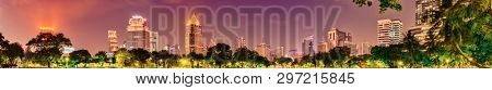 Panoramic view of Bangkok skyline. Night cityscape of Bangkok, Thailand. View from Lumphini park