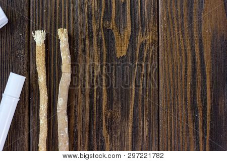 Miswak Sticks On The Wooden Table With Place For Text. Great Photo For Your Needs.