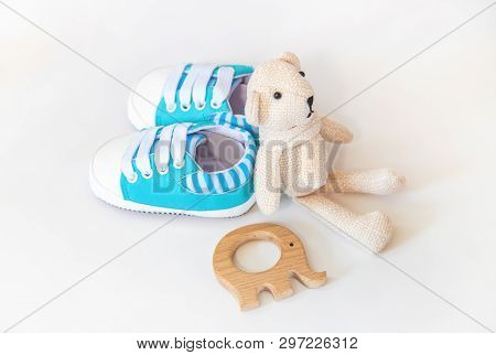 Newborn. Baby Accessories On A Light Background. Selective Focus.