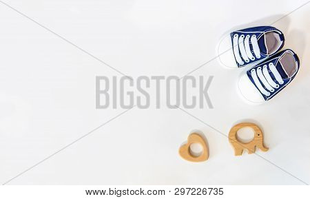 Newborn. Baby Accessories On A Light Background. Selective Focus.