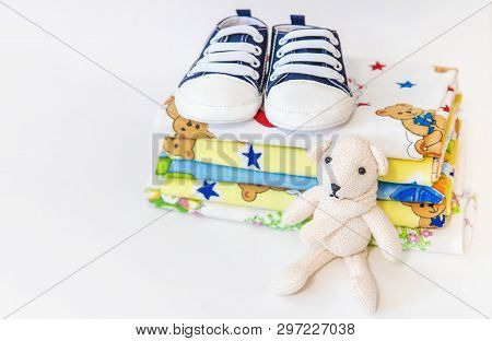 Newborn. Baby Accessories On A Light Background. Selective Focus.
