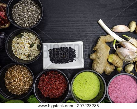 Vegan Health Food Selection With Mixed Seeds, Berry Powders, Ginger, Garlic. Super Foods High In Ant