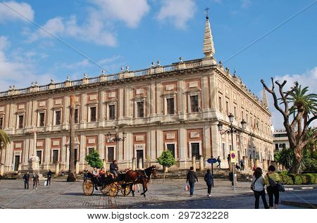SEVILLE, SPAIN - APRIL 1, 2019: Exterior of the Archivo General de Indias. Built in 1584 as a merchants exchange, the building has housed the state archives of colonial affairs since 1785.